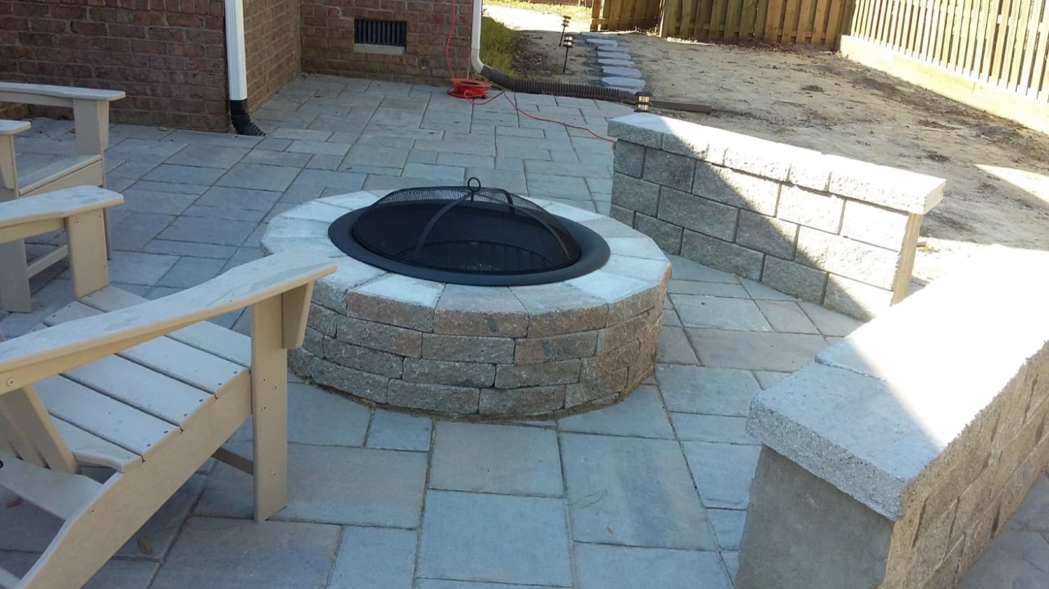 Paver patio with stone fire pit